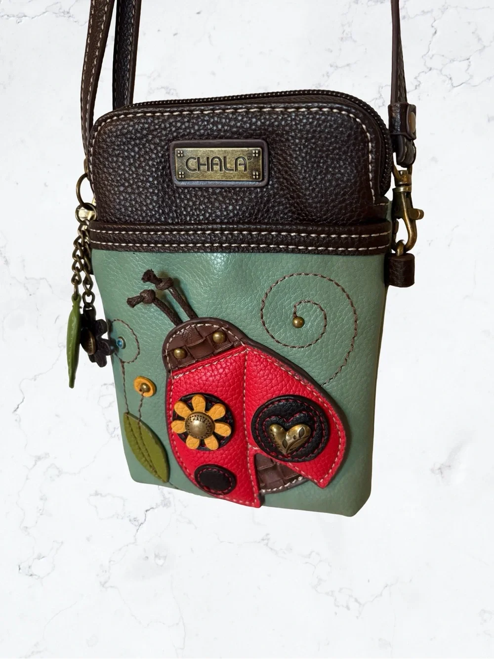Chala Mint Green Crossbody with Red Ladybug and Brown Trim